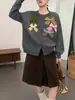 Elegante chaqueta suéter con lazo tridimensional, nuevo modelo otoño e invierno 2026, cárdigan de punto holgado de alta gama con cuello redondo para mujer