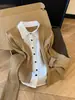 Cardigã de malha cinza falso de duas peças com gola de camisa, top feminino de design estilo coreano para o outono