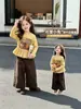 Conjunto de Primavera y Otoño para Niñas 2026 Nuevo Conjunto de Dos Piezas con Top de Dibujos Animados Elegante y Pantalones Anchos para Niña Tendencia