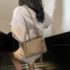 Bolsa de mão tipo balde com sensação de luxo, nova moda primavera 2025, bolsa de ombro simples e versátil, tendência, bolsa carteiro casual