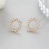 Pendientes S925 al por mayor, pendientes exagerados de circonita de alta calidad, pendientes de aguja de plata, elegantes pendientes de cobre puro con borde cruzado.