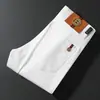 Jeans para Hombre Otoño e Invierno Pantalones Gruesos Marca de Moda Lyocell Color Negro Fijo Corte Delgado Versátiles Pantalones Largos