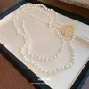 Collar de Perlas con Flor de Zirconia Hueca, Lujo Ligero y Sensación de Alta Gama, Cadena para Suéter de Nicho, Collar con Temperamento de Moda Retro al por Mayor