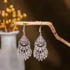 Pendientes Imitación Plata Miaoli Estilo Minoritario Pendientes de Campana de Pavo Real con Borla Joyería para Orejas de Mujer Hojas Huecas Suministro al por Mayor