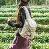 Mochila esportiva pequena transfronteiriça, mochila pequena estilo japonês, novo modelo 2026, bolsa para viagem ao ar livre, lazer, montanhismo, bolsa leve