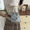 Bolsa Balde Jeans Color Block Retrô para Mulheres 2026 Nova Moda Versátil para o Dia a Dia Ombro Transversal com Design de Múltiplos Bolsos