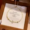 Pulseira de Argola com Pingente de Flor em Zircônia Francesa Tipo Puxar Simples Moda para o Dia a Dia Anel de Mão Toque de Luxo Leve High-end Joia de Mão Versátil