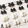 Arte de uñas de celebridad de internet joyería de lazo esmerilado palito para uñas taladro cinta estéreo aleación lazo pequeño decoración al por mayor