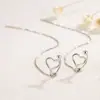 Clip para oreja y alambre para oreja en forma de corazón hueco, un accesorio de doble uso con un encanto juvenil, sensación de alta gama, personalidad única, estilo coreano moderno, moderno y versátil
