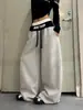 Pantalones de chándal de estilo americano, dos piezas falsas, patchwork, bloques de color, estampado de letras para mujer, nuevo diseño versátil de verano, pierna ancha holgada