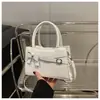 Bolso Sencillo Nuevo Versátil Moda Hombro Único Nicho 2025 Estilo Casual Primavera Bolso de Mano con Lazo Bolso Cuadrado Pequeño
