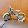 Diversión Creativa Divertida Móvil Deslizante Pareja de Bicicleta Joyería Llavero Adornos Pequeños Adornos de Regalo Venta al por Mayor