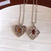 Collar Retro Francés de Zirconia Ojo de Tigre Corazón Hueco Cadena de Suéter de Personalidad Única Diseño de Nicho Accesorio de Collar para Mujer