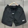 Pantalones cortos americanos nuevos de verano para hombre, de marca de moda, diseño fino, nicho, holgados, de talla grande, deportivos, casuales, de cinco puntos