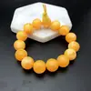 Pulsera de imitación de cera de abeja, cuenta redonda de 14 mm, pulsera fluorescente, venta al por mayor, ámbar de aceite de pollo, pulsera para parejas