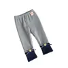 Em estoque QK262896 Calça infantil forrada com fleece 2026 outono estrela laço cor contrastante legging com punho