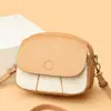 Bolso pequeño cuadrado bicolor para mujer, nuevo bolso tipo saddle vintage 2025, bolso pequeño versátil casual de hombro y cruzado, bolso de mano simple de cuero suave