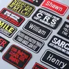 Parches bordados al por mayor transfronterizos, insignias bordadas rectangulares, parches decorativos en inglés para chaqueta de trabajo retro americana