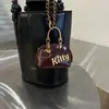 2025 Nueva Bolsa Hecha a Mano de Color Claro Accesorios de Aleación Kt Saturno DIY Llavero Colgante de Bolso de Moda