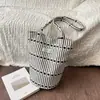Bolsas de Mujer de Tendencia de Nicho Transfronterizas 2026 Nuevo Bolso de Hombro Versátil Casual para el Trabajo Bolso Tote Bolso Cubo Bolso de Tela