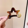 Presilha de Cabelo Dourada Estrela Estilo Coreano para Mulheres 2026 Novo Modelo, Pente Elegante de Alta Qualidade, Acessório de Cabelo Versátil de Luxo
