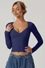 2026 Nuevo Amazon Aliexpress Boutique Stock Listo Camiseta de Manga Larga con Cuello en V para Mujer Top con Copa de Costura Estación Independiente