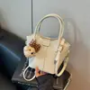 Bolso pequeño moderno y de moda para mujer, nuevo modelo 2026, bolso cruzado exquisito y versátil con un toque de alta gama, bolso de hombro tipo cubo, bolso de mano pequeño