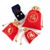 Punto rojo dorado bolsa de la suerte franela cordón de ajuste bolsillo con cordón festivo de Año Nuevo regalo empaque de joyería bolsa de dulces con palabra de la suerte