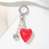 Bolso Creativo de Plata con Forma de Corazón y Lazo Accesorios para Ropa Llavero Versátil para Manualidades Colgante Pequeño Llavero Encanto