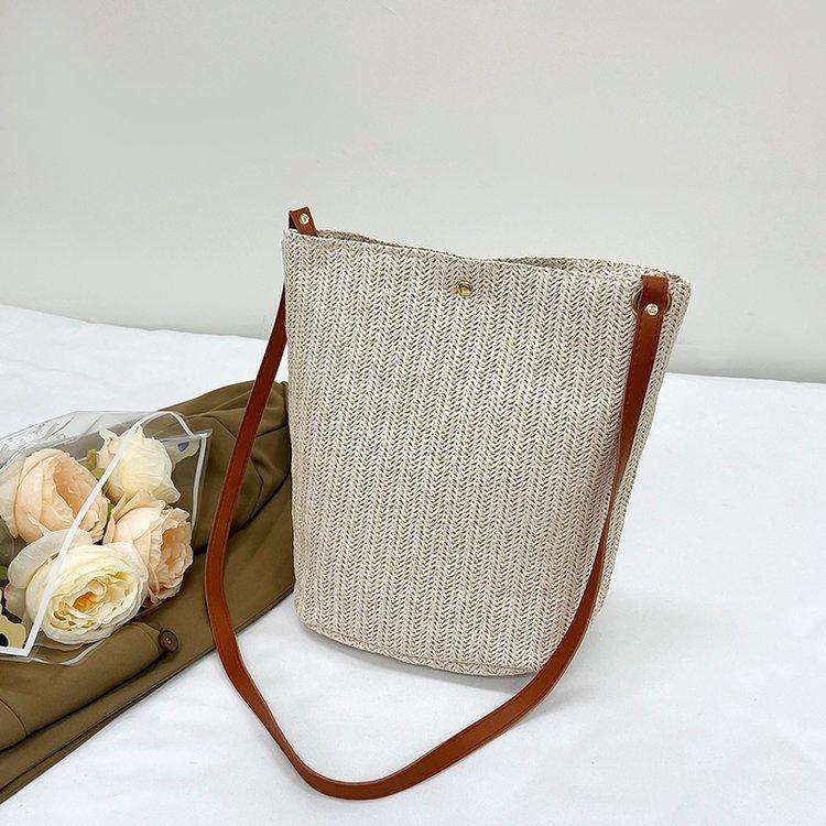 编织包女包新款潮2024夏草编简约百搭小清新水桶包个性单肩斜