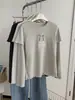 Camiseta de Manga Larga con Lazo y Letra Otoño 2026 para Mujer, Estilo Coreano Copo de Nieve Algodón Falso Dos Piezas Camiseta Básica Estudiante