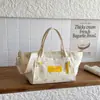Bolso de Hombro de Lona Nuevo Diseño de Nicho 2026 Versión Coreana Bolso Tote de Nicho para Mujer Ligero Bolso de Hombro Sencillo