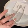 Colar Delicado de Pérolas com Laço para Mulheres, Design de Nicho de Luxo Leve, Corrente para Clavícula, Acessório de Pescoço Elegante e Sofisticado