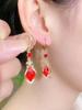 Aretes rojos de alta gama aretes únicos para mujer aretes estilo occidental 2023 nuevos aretes geométricos de nicho populares de moda