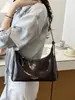 Bolso de axila para mujer transfronterizo 2026 nuevo de moda otoño gama alta nicho súper popular bolso de hombro bolso cruzado para el día a día
