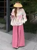 Elegante conjunto de dos piezas para mujer: camisa con bordados y protección solar y pantalones casuales de pierna ancha, un atuendo de verano único y hermoso