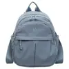 Bolso de hombro doble tendencia transfronteriza 2026 otoño nuevo bolso para estudiante gran capacidad ligero tela de nailon bolso para mujer mochila de viaje