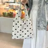 Bolsa de lona de liquidação Bolsa de ombro feminina Bolsa de outono e inverno Bolsa de grande capacidade Bolsa escolar de estudante Bolsa de pano Bolsa de compras