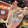 Moda de Alta Gama Arcilla Pedrería Bulldog Francés Cadena de Perlas Llavero Cadena Creativa de Pata Chapado Perro Pequeño Colgante para Coche