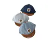 Versão coreana 2025 primavera e verão infantil Chapéu de sol de brim com urso infantil boné de proteção solar boné de aba boné de beisebol pato