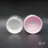 El fabricante suministra caja redonda morada para polvos sueltos 16g material de embalaje de polvo fijador plástico contenedor cosmético