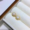 Aretes de Tuerca de Perla de Agua Dulce Natural con Elemento de Giro Floral Estilo Ins Luna Púrpura Nicho Elegante Versátil
