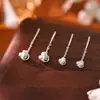 Pendientes de nudo Ruyi estilo socialité de lujo ligero pendientes de borla de bola auspiciosa Anillo de Amazon envuelto en nudo concéntrico línea de oreja corta