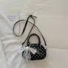 Bolso tipo almohada liso de estilo coreano casual, 2026 nuevo de moda y elegante con lunares, de alta apariencia, bolso cruzado único