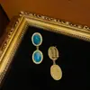 Estilo Occidental Chapado en Cobre Antiguo con Oro de 18 Quilates para Crear un Color Dorado Vintage, Combinado con Pendientes Colgantes Dobles Redondos Incrustados con Degradado de Color Tinta