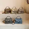 Bolsa de Mão Pequena Versátil Estilo Ins para Mulheres 2026 Nova Tendência Moda Bolsa Kelly Texturizada Outono e Inverno Bolsa Transversal
