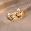 Diseño de nicho pendientes de plumas y perlas de doble uso otoño e invierno 2022 nuevos pendientes sencillos de moda con alas de ángel