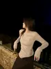 Suéter de punto con borde enrollado y cuello redondo para mujer, nuevo top básico de otoño e invierno, adelgazante, estilo europeo y americano, elegante para ir al trabajo