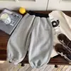 Calça de moletom Kino de inverno para meninos e meninas, estilo coreano, versátil, calça casual espessa, roupas infantis de Huzhou Zhili, calça comprida infantil