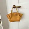 Bolso de cubo de mano de alta gama de moda 2026 nuevo bolso de hombro de moda bolso cruzado de alto valor bolso tejido vintage